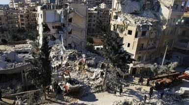 Rovine dopo un bombardamento a Idlib