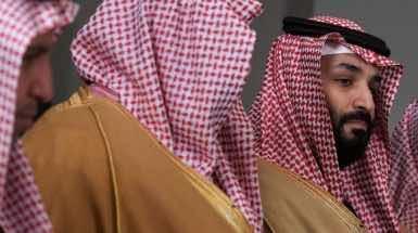 Crown Prince Mohammad Bin Salman between Saudi officials